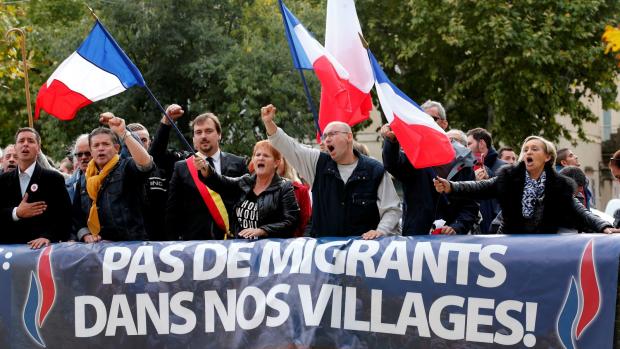 The caption reads: No immigrants in our village.